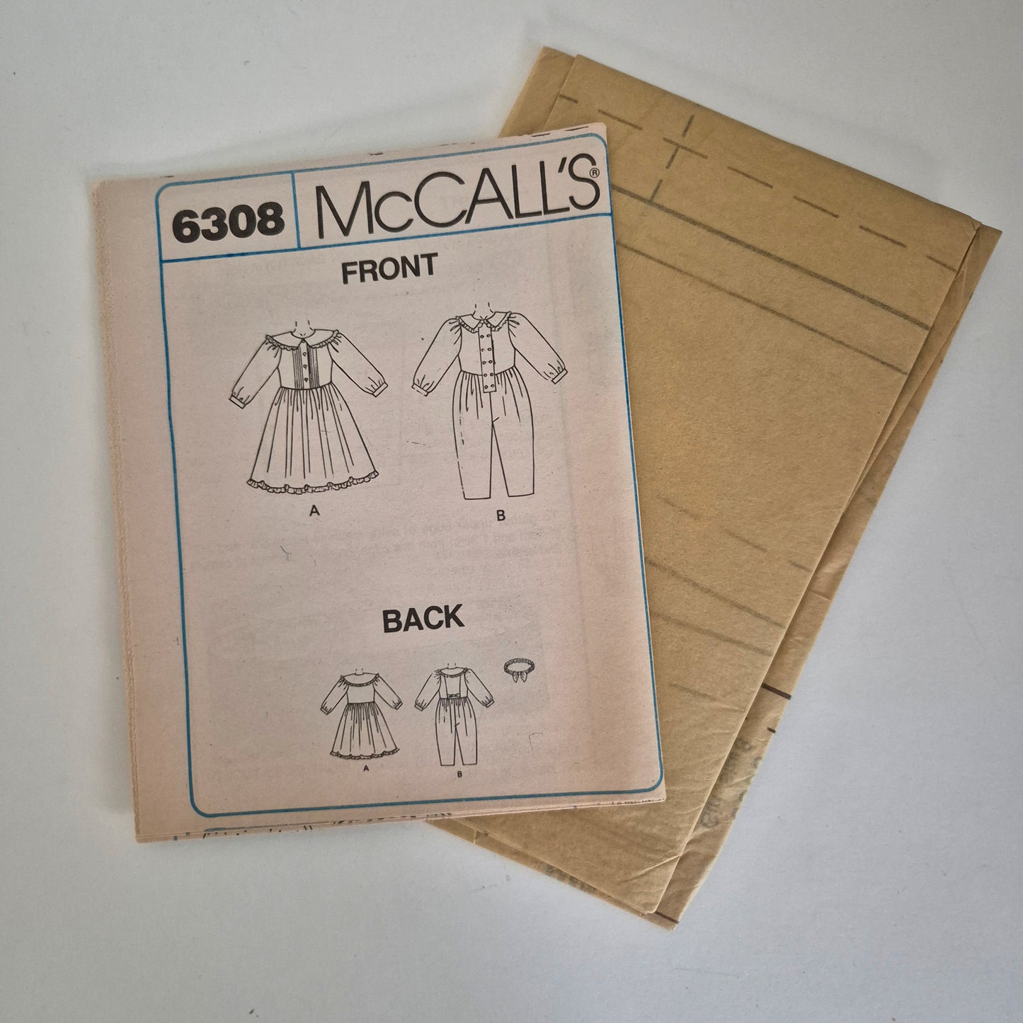 McCall's 6308, girls jumpsuit and dress pattern, size 8