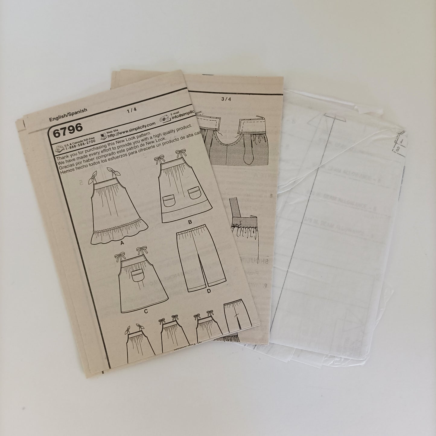 New Look 6796, girls top dress and pants pattern, Sizes 1/2 to 4