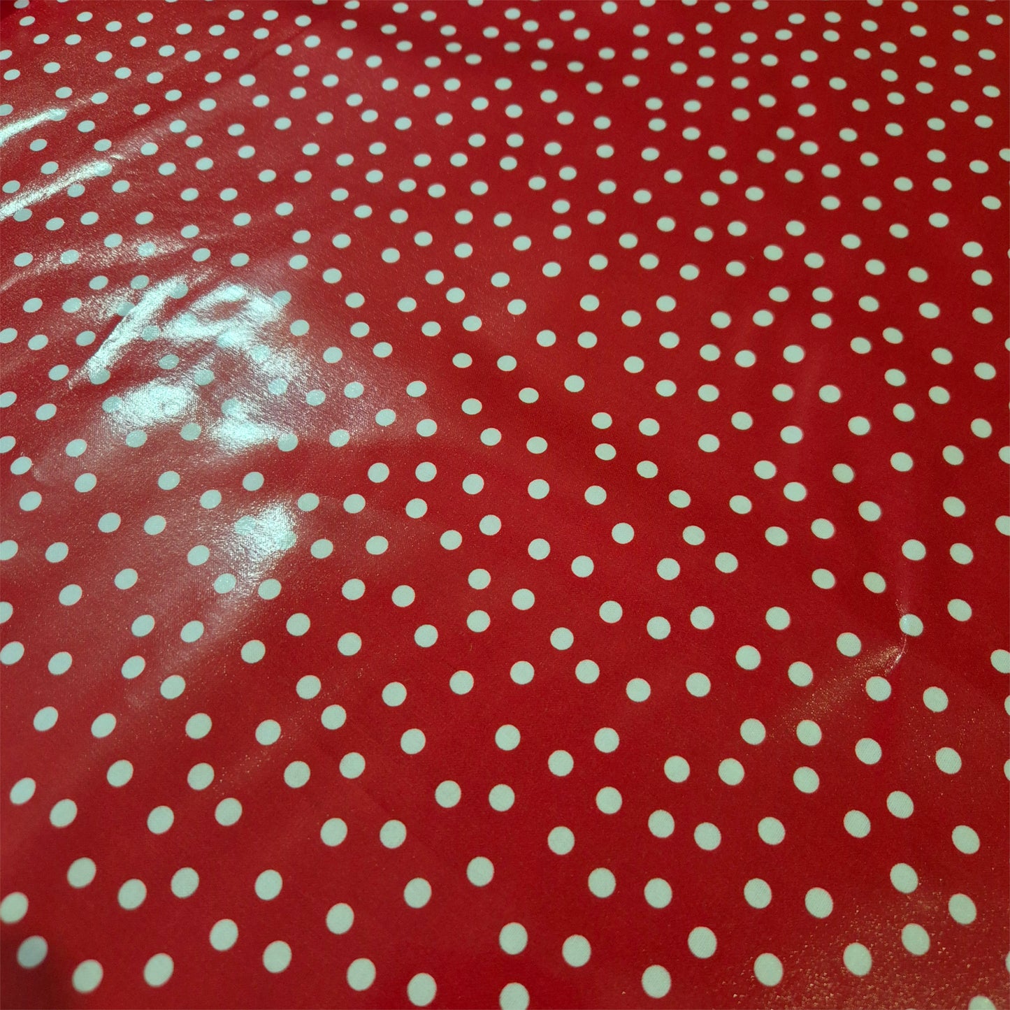 Laminated Cotton - Red with White Dots - Water Damage - 145cm remnant - Fabric Rescue