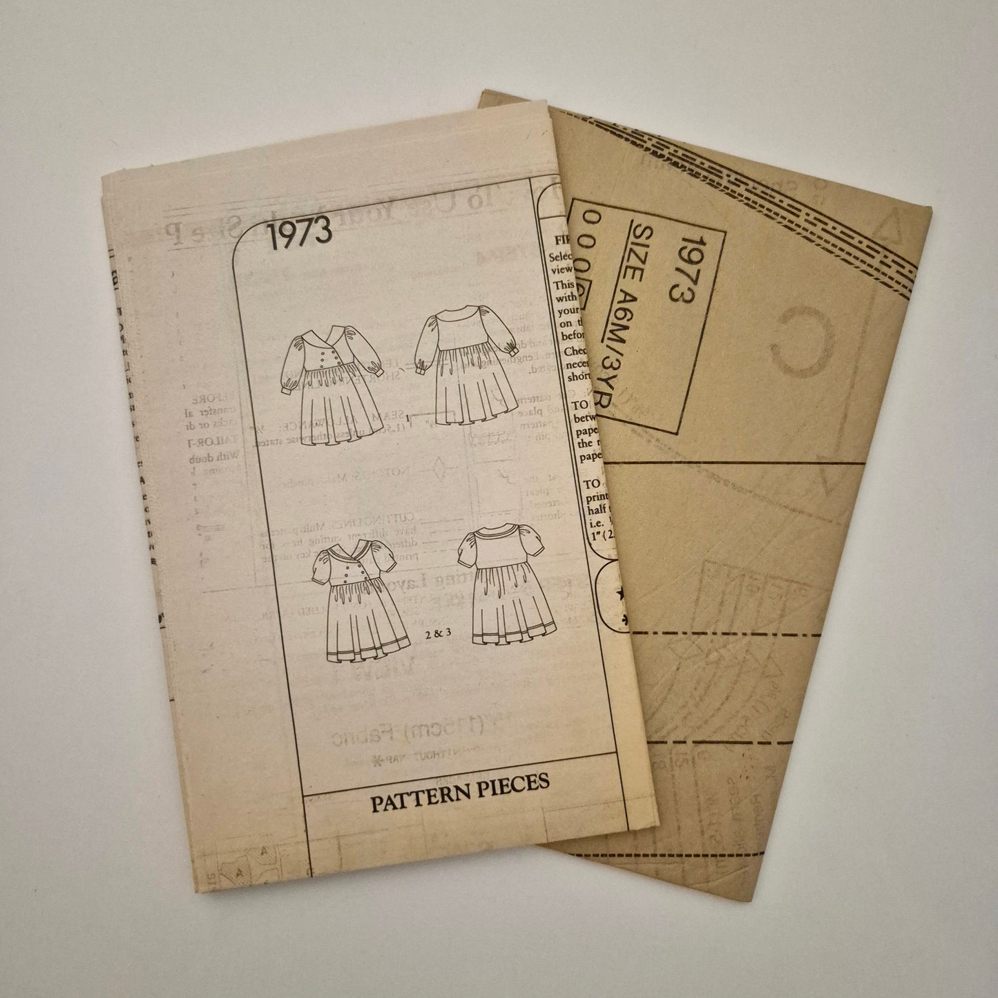 Style 1973, Children's dresses pattern, Sizes 6m to 3