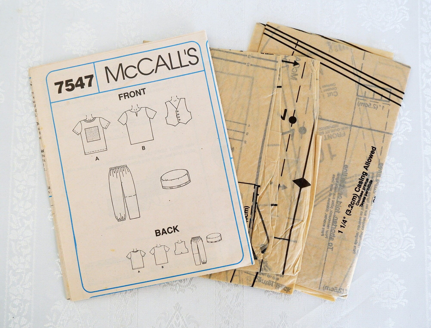 McCall's 7547, childrens vest t-shirt top pants shorts and hat pattern, sizes 2 - 4