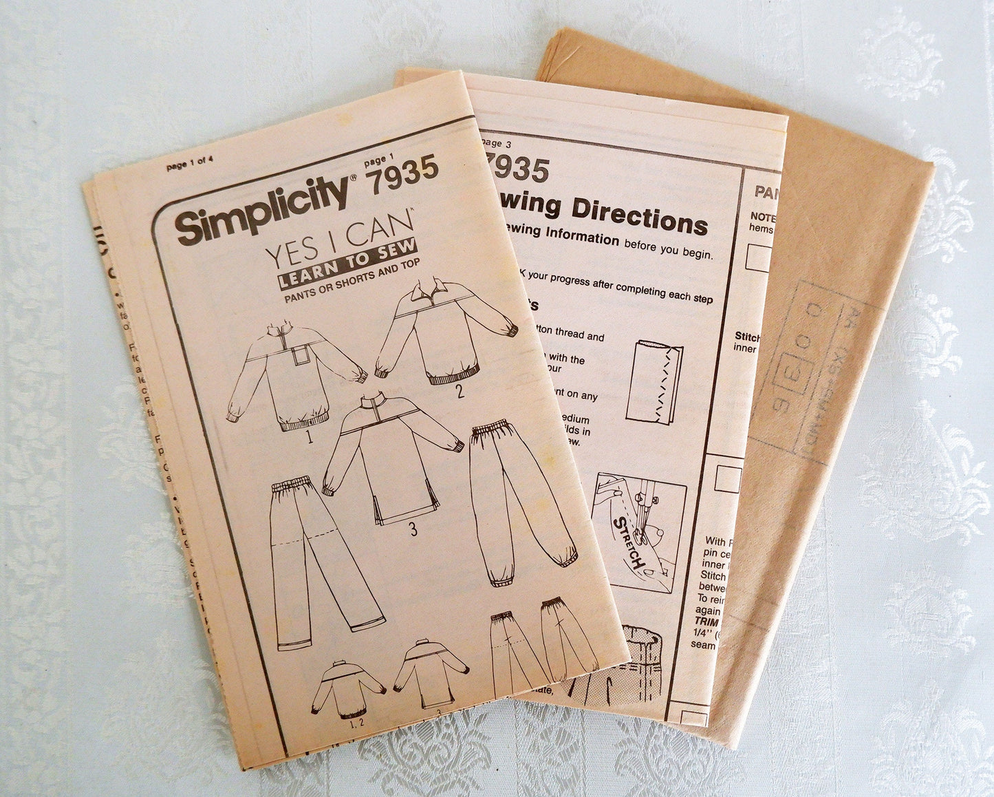Simplicity 7935, women's men's and boys Knit Pants or Shorts and Top pattern, sizes XS - MD