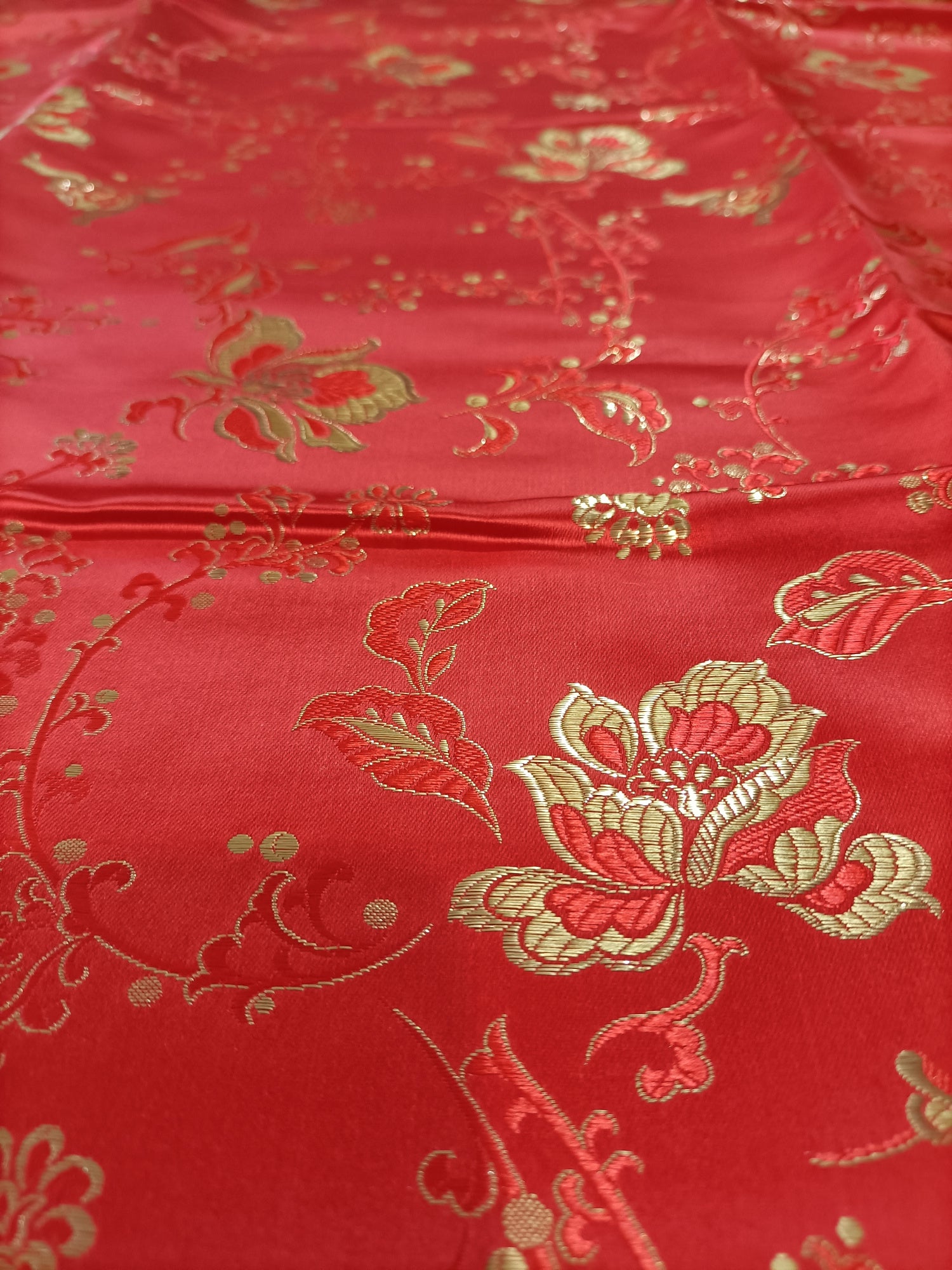 Red satin brocade closeup
