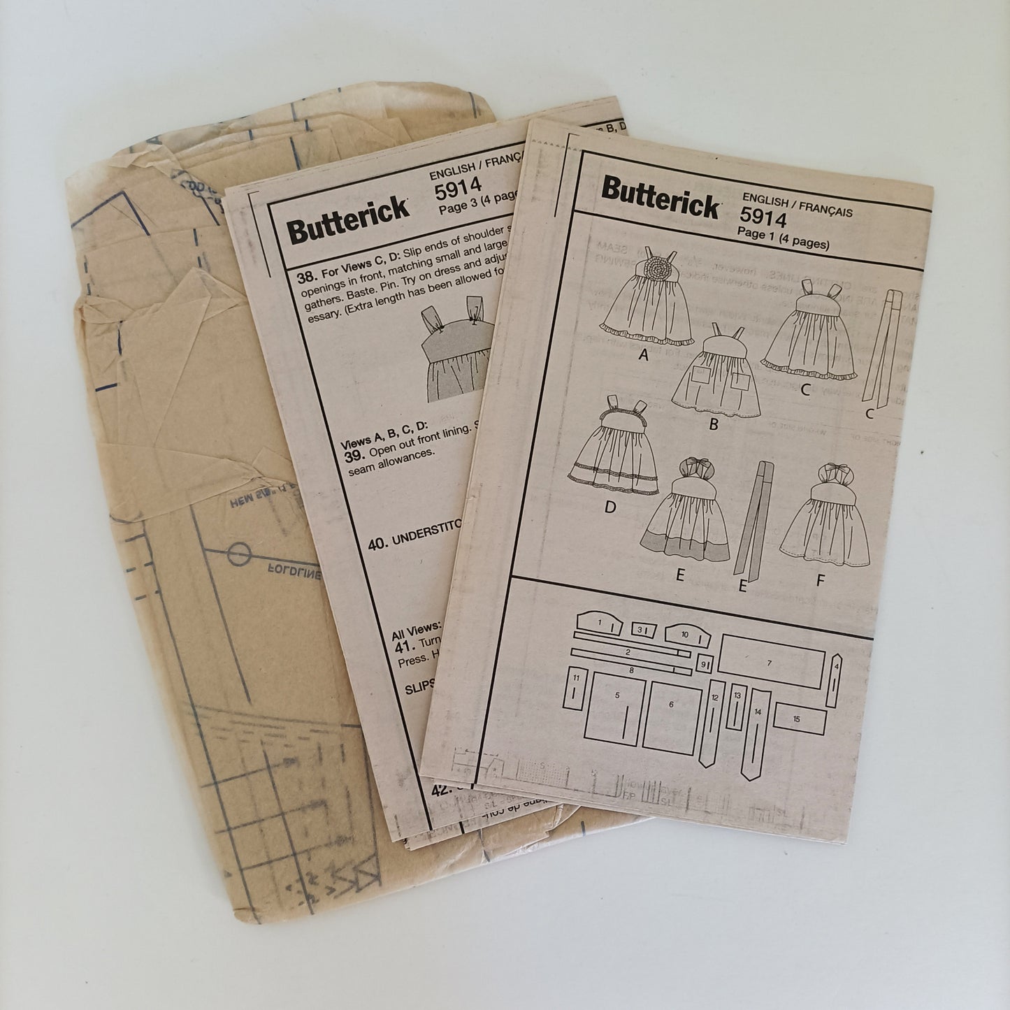 Butterick B5914, children's dress and belt pattern. Sizes 2 to 5