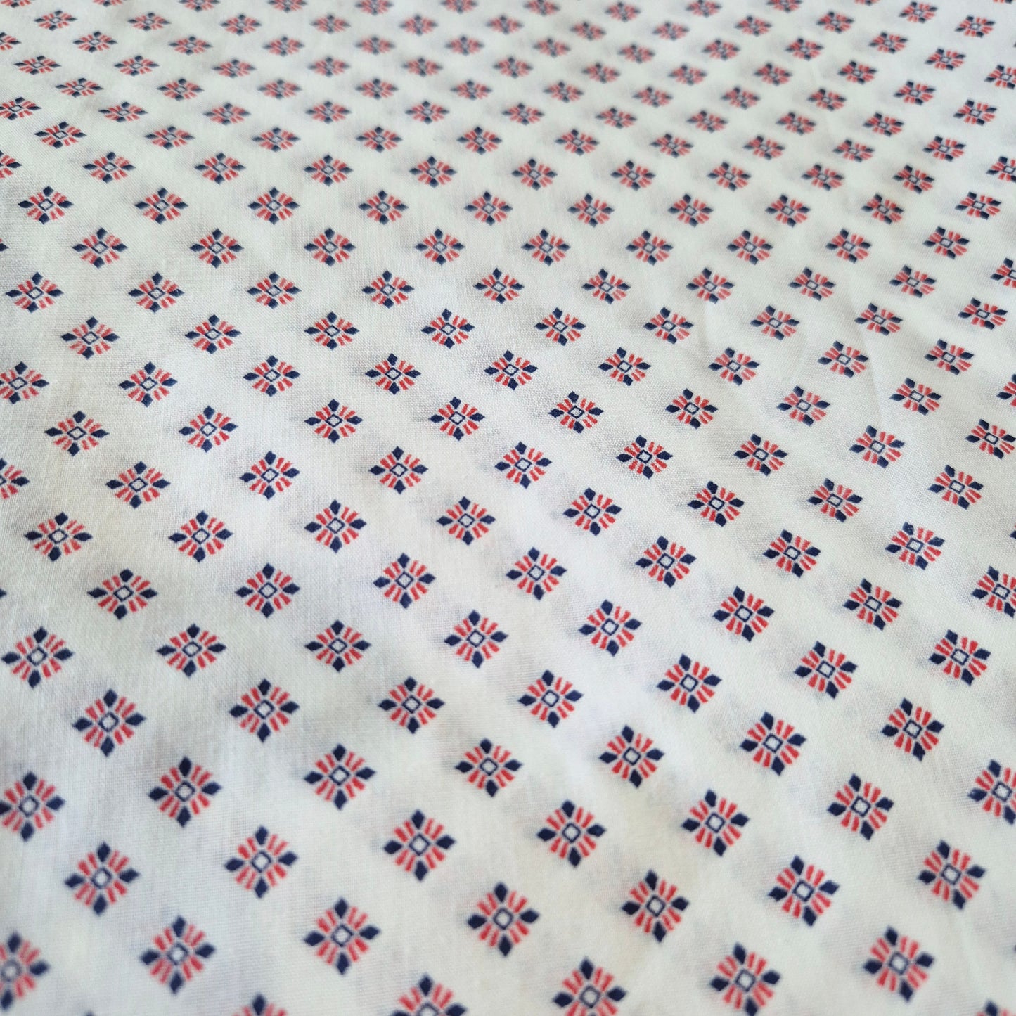 fabric with red and blue diamond design