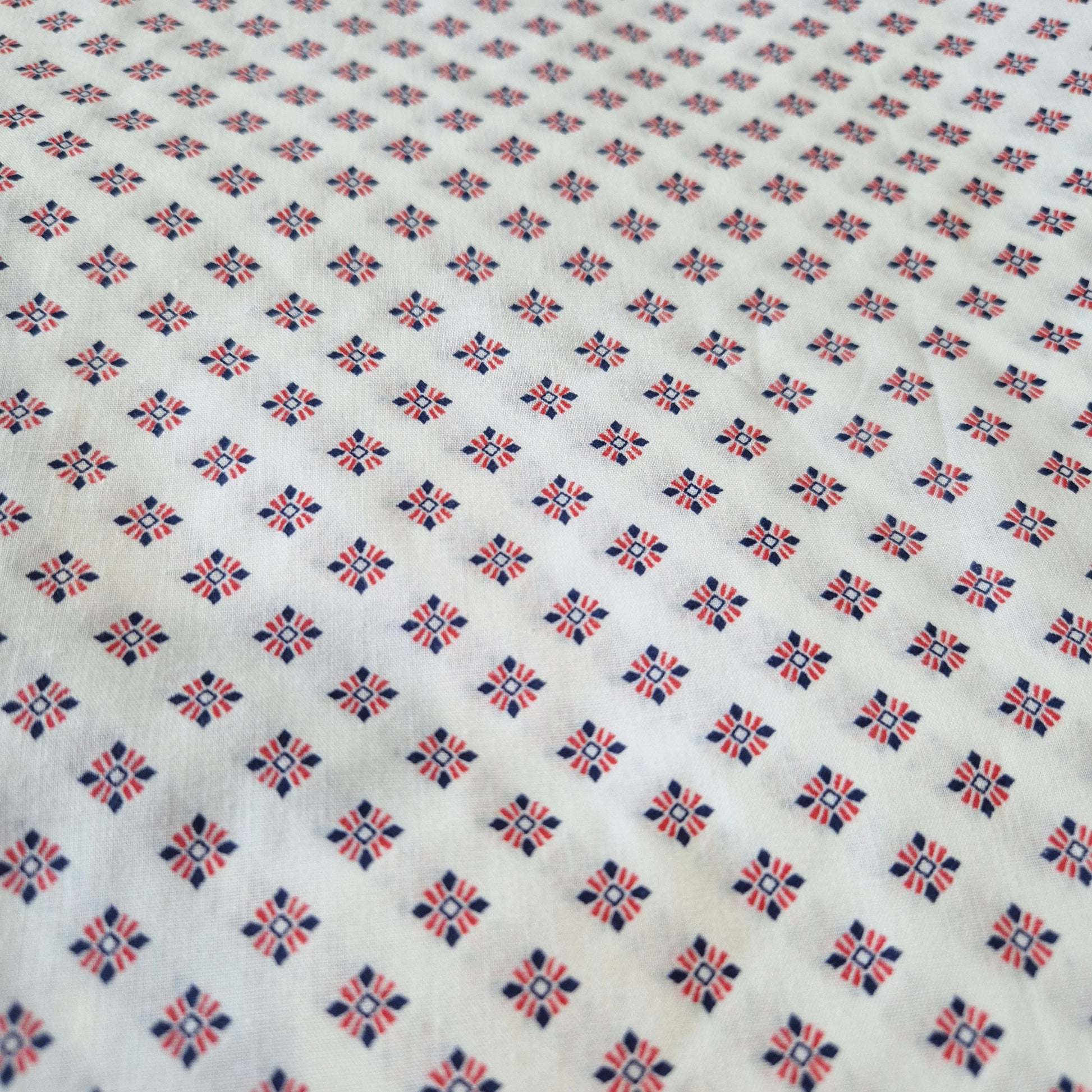 fabric with red and blue diamond design