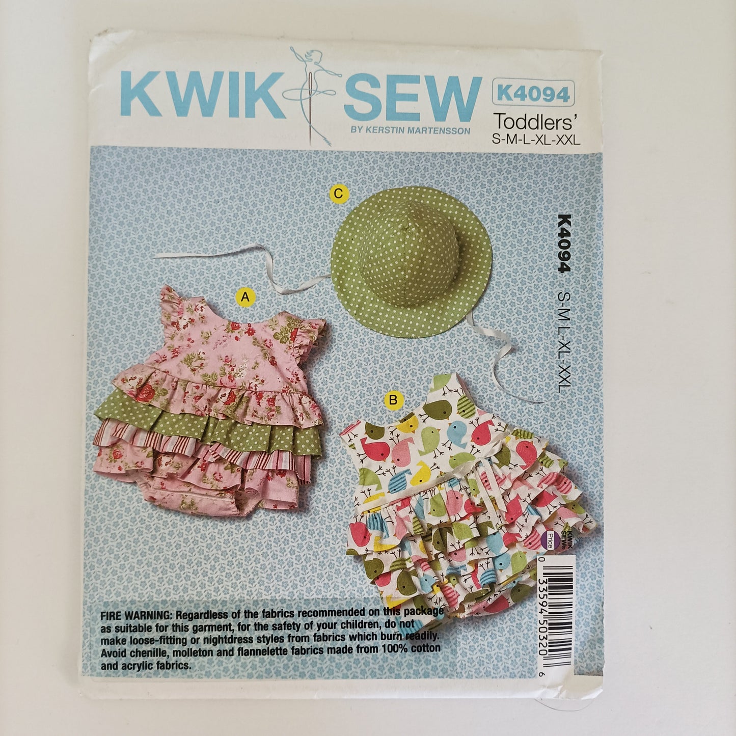 Kwik Sew K4094, Baby rompers and hat pattern, sizes newborn to 24 months