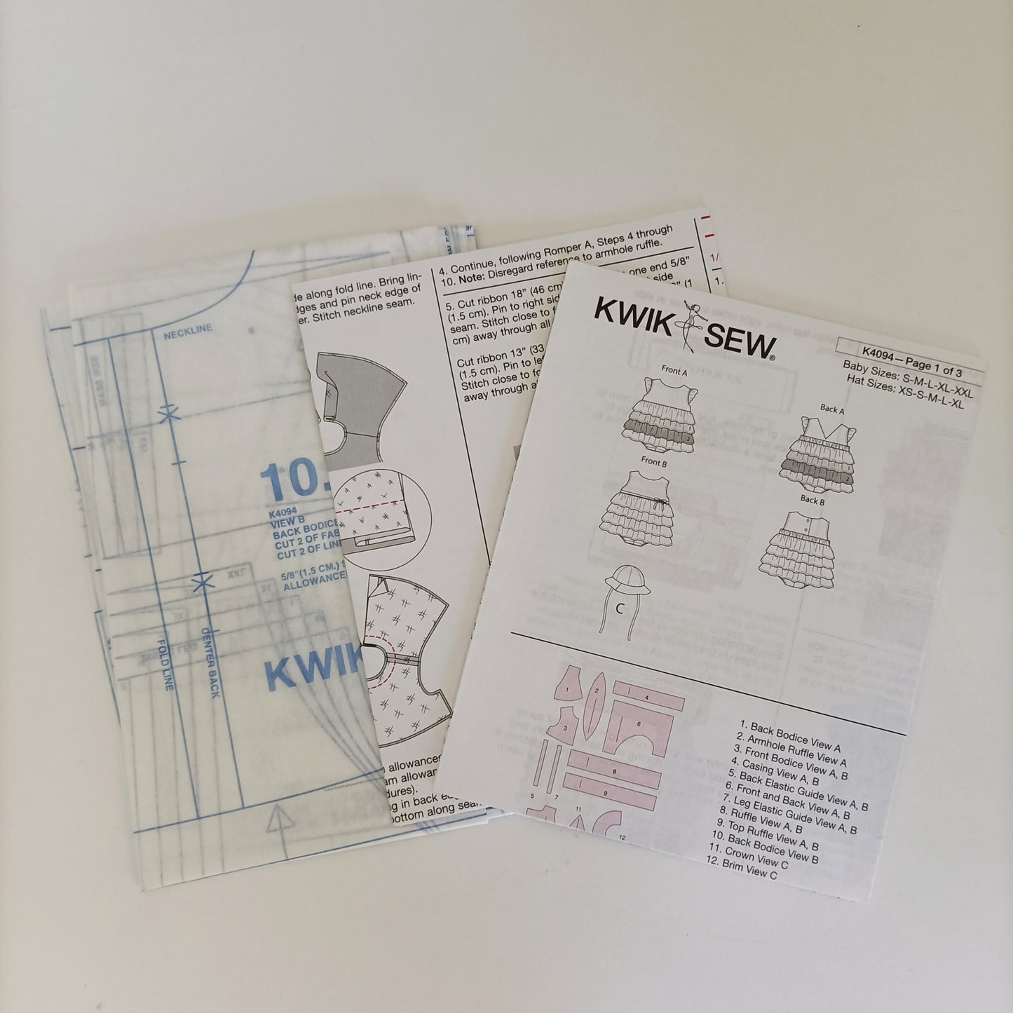 Kwik Sew K4094, Baby rompers and hat pattern, sizes newborn to 24 months