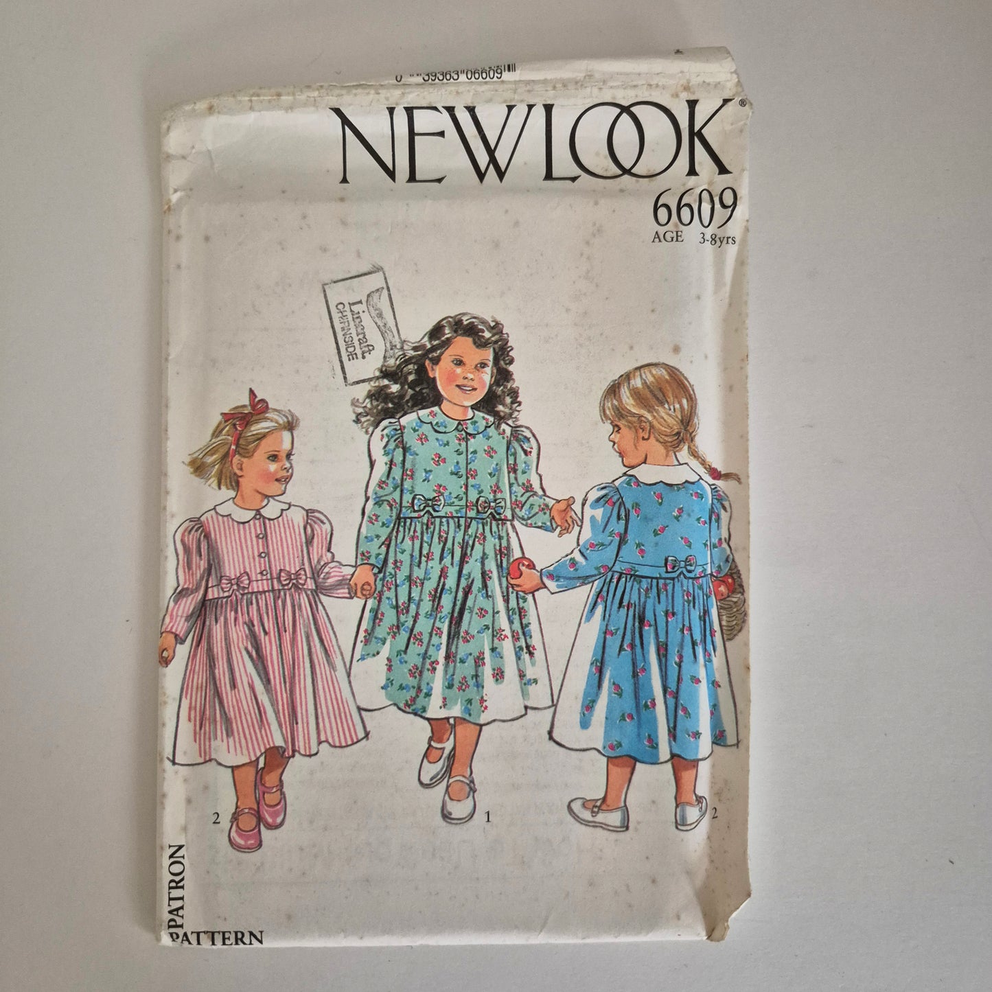 New Look 6609, girls dress pattern, ages 3 to 8