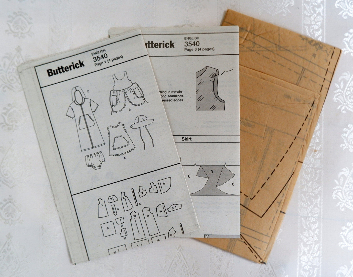 Butterick 3540, infant cover-up, dress, panties and hat pattern. Sizes L - XL