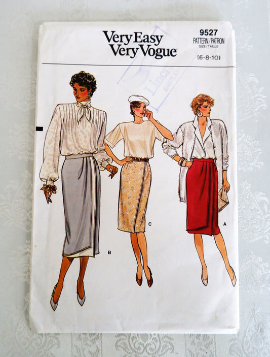 Vogue 9527, skirt pattern. Sizes 6 - 10. Partially cut but all sizes still usable.