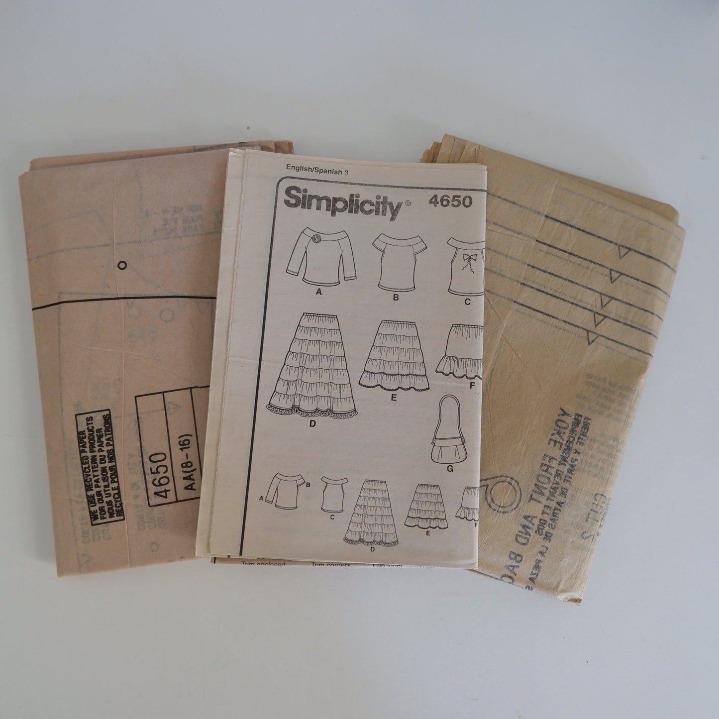 Simplicity 4650, girls skirt purse and knit tops pattern. Sizes 8 - 16